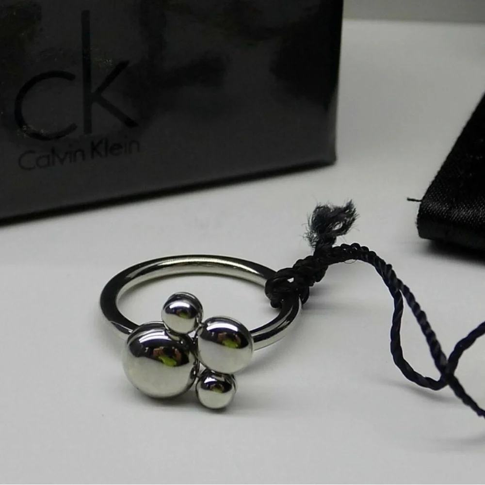 NWT CALVIN KLEIN SILVER SPIN RING SIZE 8